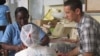  A woman receives information on postpartum depression at Komfo Anokye Teaching Hospital in Kumasi, Ghana. (Credit: K. Gold, University of Michigan medical School) 