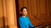 Myanmar's State Counsellor Aung San Suu Kyi gives a speech at the Swedish parliament in Stockholm