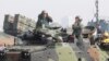 Soldiers on an amphibious assault vehicle communicate during military exercises at the Zuoying naval base in southern Taiwan, Jan. 18, 2017. Singapore and Taiwan will continue to carry out a military training program begun in 1975, Taiwan officials said this week.