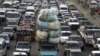 A traffic jam, one of five key issues Egyptian President Mohamed Morsi outlined in his Al Nhada (Renaissance) project, is pictured in old Cairo October 8, 2012, a day after his 100th day in power. 