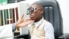 Lemuel Tebuck, now 8 years old, with aligned eyes from strabismus surgery, undergoes a regular check-up at Yaoundé Central Hospital, Yaoundé, Cameeroon, April 2016.