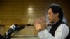 Pakistani Prime Minister Imran Khan addresses Kashmir's Legislative Assembly on the occasion of Pakistan's Independence Day, in Muzaffarabad, capital of Pakistani Kashmir, Aug. 14, 2019. 