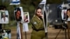 ARCHIVO - Una soldado israelí captada el 7 de febrero de 2024 en el sitio del Festival Nova donde el grupo Hamás disparó contra asistentes y secuestró a un número significativo de ciudadanos de Israel y de otras partes del mundo. 