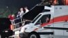 A person believed to be Otto Warmbier is transferred from a medical transport airplane to an awaiting ambulance at Lunken Airport in Cincinnati, Ohio, U.S., June 13, 2017. 