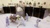 Technicians work on NASA's next Mars-bound spacecraft, the Mars Atmosphere and Volatile Evolution (MAVEN) spacecraft, as it is displayed for the media at the Kennedy Space Center in Cape Canaveral, Florida September 27, 2013. MAVEN is the first spacecraft
