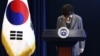 South Korean President Park Geun-hye bows during her address to the nation at the presidential Blue House in Seoul, Nov. 29, 2016.