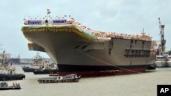 The Indian aircraft carrier is docked at a shipyard after its launch in Kochi, India, Aug. 12, 2013. 