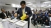 Lalit Bhanot, who was recently elected as the secretary general of the Indian Olympic Association (IOA), casts his ballot for the election of Vice President, Joint Secretary and Executive Council members of IOA in New Delhi, India, December 5, 2012.