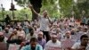 FILE - Activists shout slogans during a protest in front of Assam House against the final draft of the National Register of Citizens (NRC) in the northeastern state of Assam, in New Delhi, Aug. 4, 2018. 